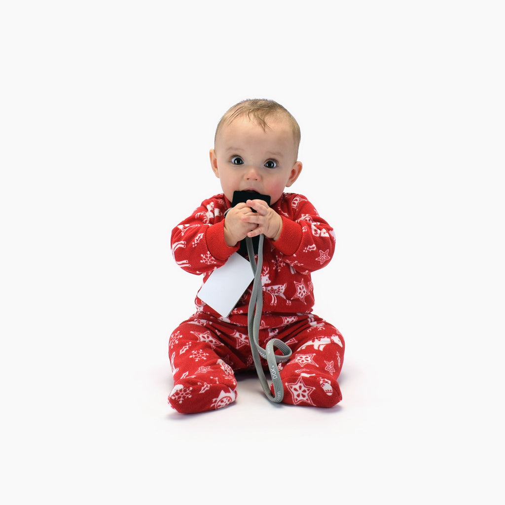 Baby with toy in mouth