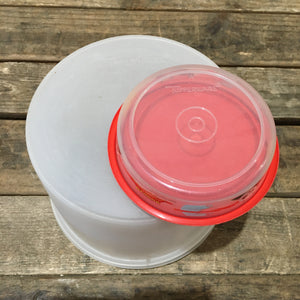 Two Circular Tupperware Containers