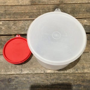 Two Circular Tupperware Containers