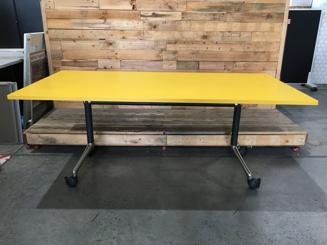 Yellow flip boardroom table on wheels