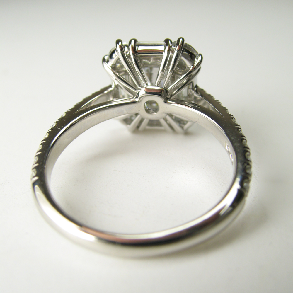 Custom emerald cut luxury mounting in platinum. Created by hand using ...