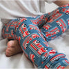boys printed leggings by bayridgecaskandkeg. Blue background with red fire truck detail.