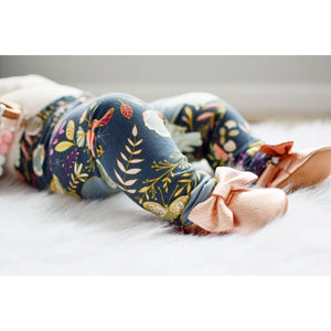 Autumn Glow printed floral baby leggings handmade by bayridgecaskandkeg styled with rose gold baby shoes and teether