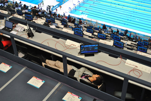 Olympic Reporter asleep on the job