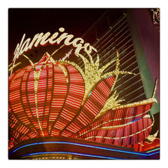 Curio & Co. goes to Rat Pack Las Vegas. Photo of Flaming Signage lights in the night. Curio and Co. www.curioandco.com