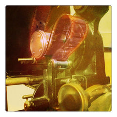 Curio & Co. looks at the dying art of film. Photo of old fashioned movie projector. Curio and Co. www.curioandco.com