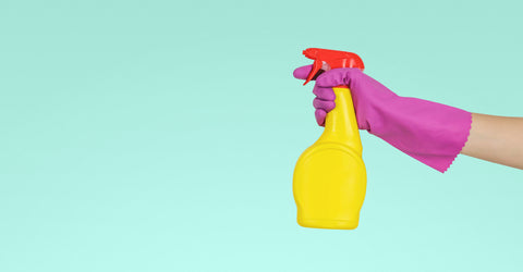 Colorful disinfectant bottle by MopTop Junk Free Office