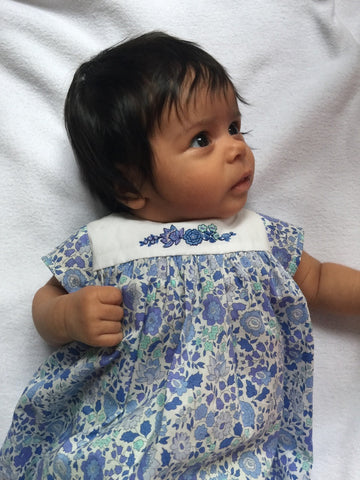Nina's very first Liberty dress with handmade embroideries