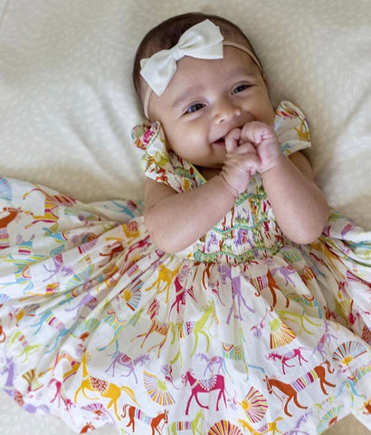 Arden in her Liberty Netti smocked dress