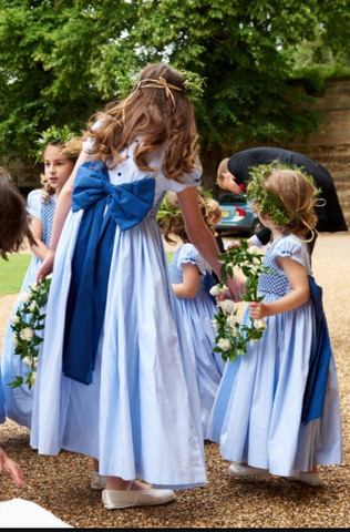 Special order of handmade smocked dresses for the wedding of Laline Hay, youngest daughter of the Earl of Errol and Captain Jeremy 