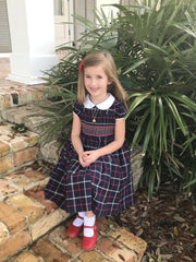 Frazier in her Tartan smocked Cerise dress looking ever so sweet!