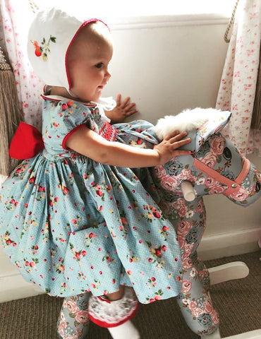 Thank you to Hâf for looking so sweet and princess like in her handmade Strawberry print Cerise Fabrice smocked dress.