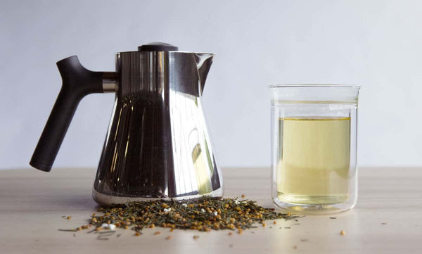 Raven Tea Kettle and Stagg Tasting Glass with Genmaicha tea on right side