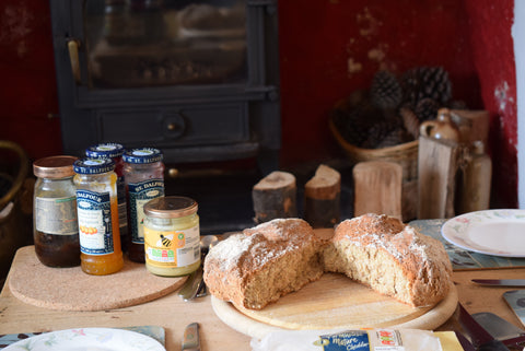 A Table Laid with Soda Bread and Jam