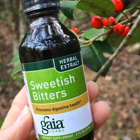 sweetish bitters herbal extract in front of bitters on branch