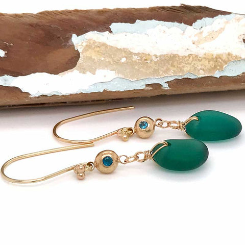 rare teal sea glass earrings with solid 14k gold charms set with blue green tourmaline stones kriket broadhurst jewellery