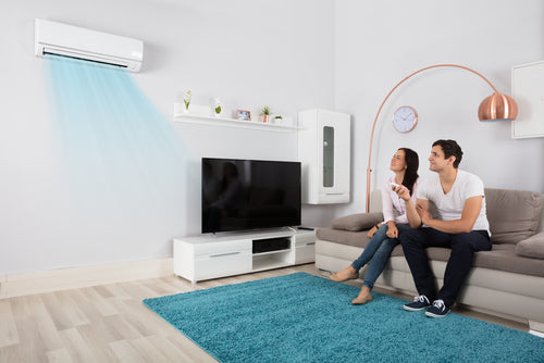 air conditioner blowing into couples living room