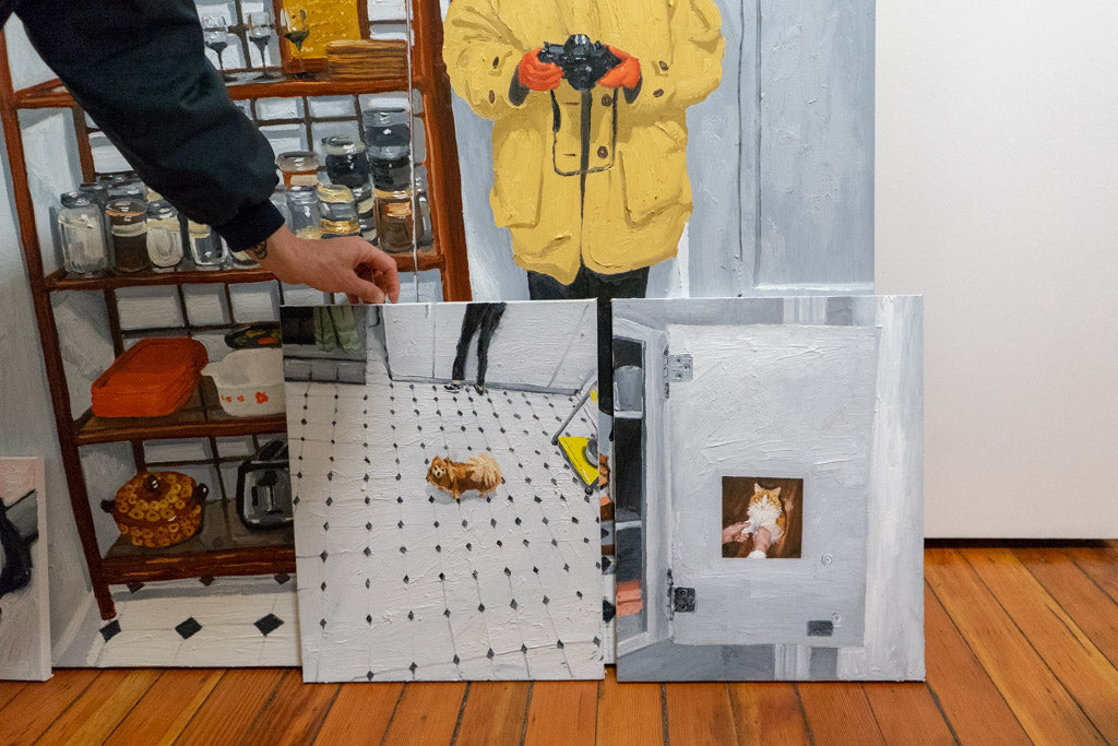 Emilio Villalba showing paintings in his home studio