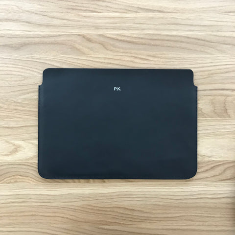 A custom super slim laptop sleeve with initials.