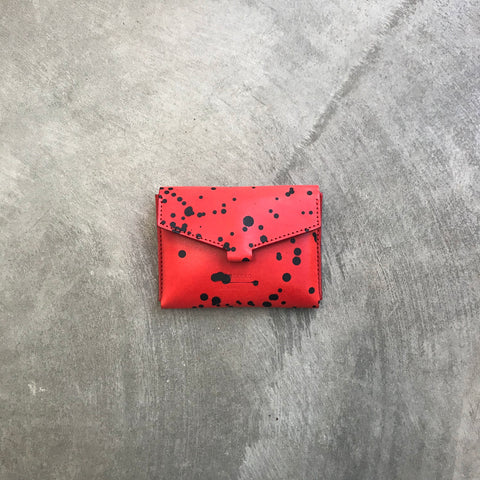 Mokoko Fold Wallet in red black dotted vegetable tanned leather.