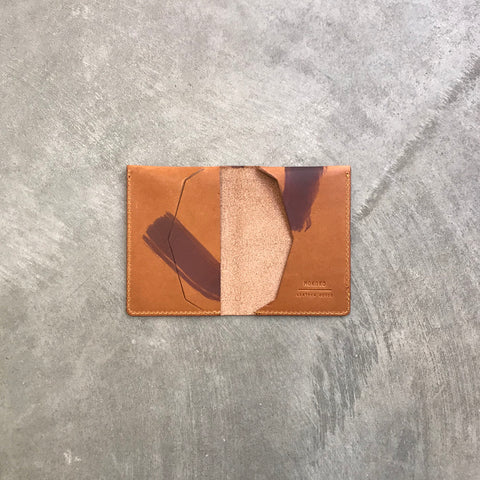 Double Slim card and cash wallet in tan painted vegetable tanned leather. Made in our studio in Tallinn, Estonia.