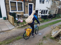 Unhealthy way to carry a guitar on a bike