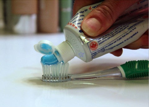 Putting Toothpaste on Toothbrush