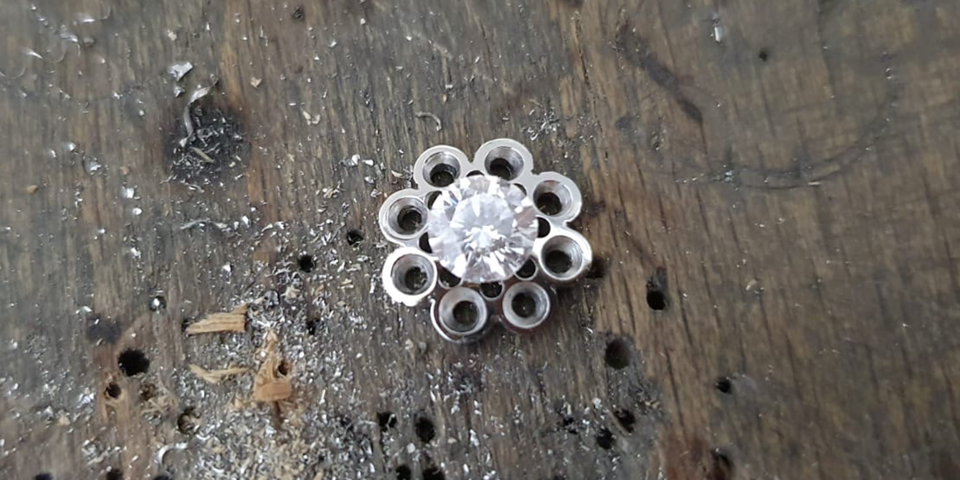 Platinum head for bespoke cluster ring cut out by Amanda Mansell