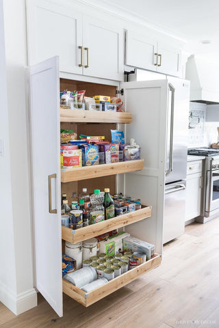 Pantry cabinet with roll out shelves by drivebydecor.com