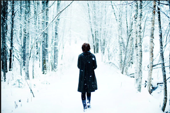 woman walking in the snow