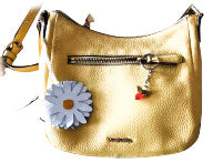 Yellow purse with white daisy