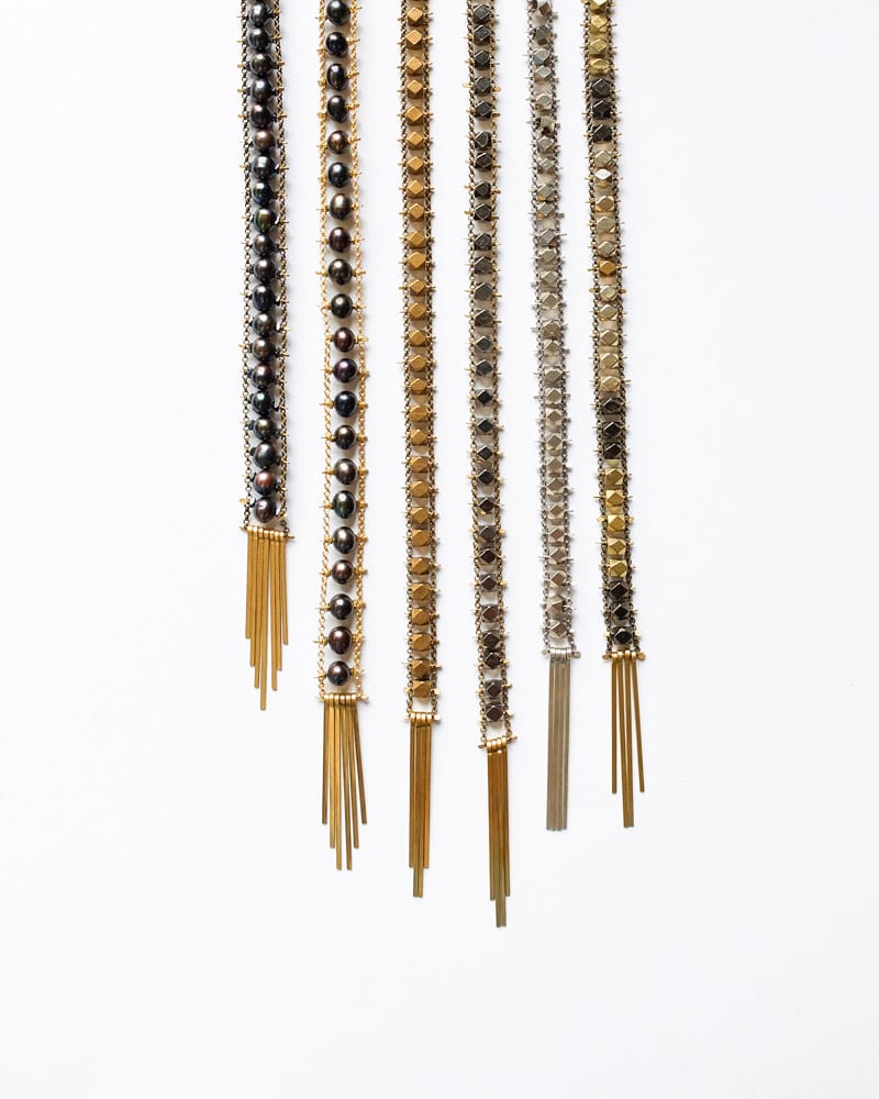 6 Demimonde handcrafted brass beaded necklaces with tassels
