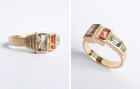 A custom-made betsy & iya yellow gold ring, featuring four colored stone baguettes. Hand-crafted in Portland, Oregon.
