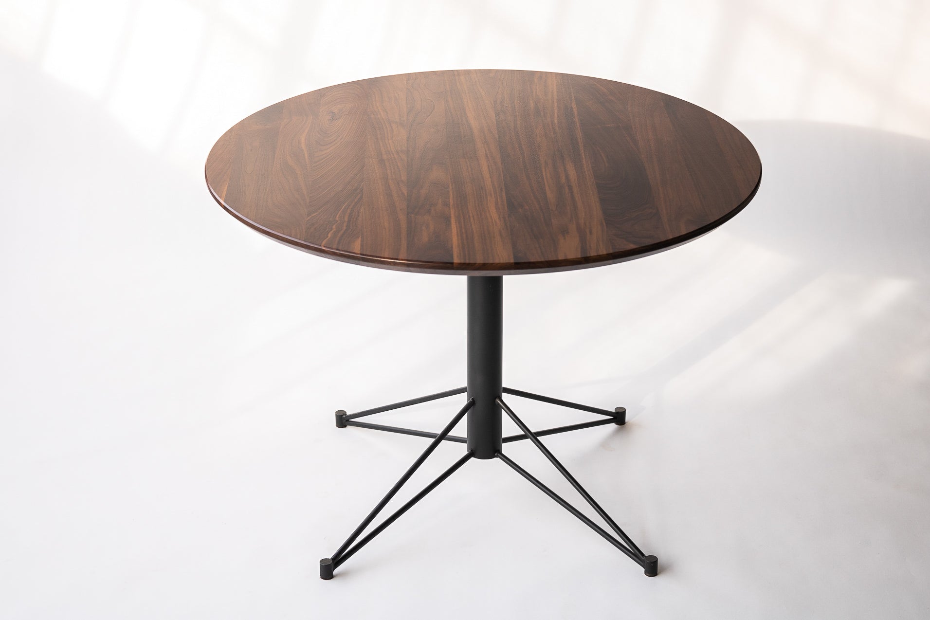 The Mast Table - Round Dining Table with Metal Base by Edgework Creative