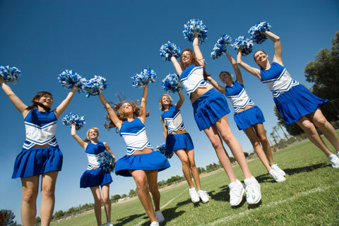 Cheerleaders cheering wearing cheer shoes from Living Cheer