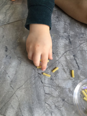 picking up small objects improve fine motor skills