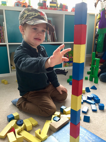 stacking blocks, improving fine motor skills