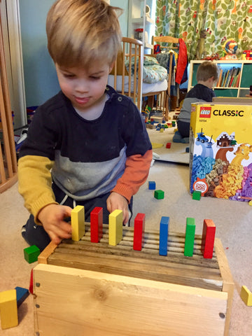 stacking wooden blocks, improve dexterity