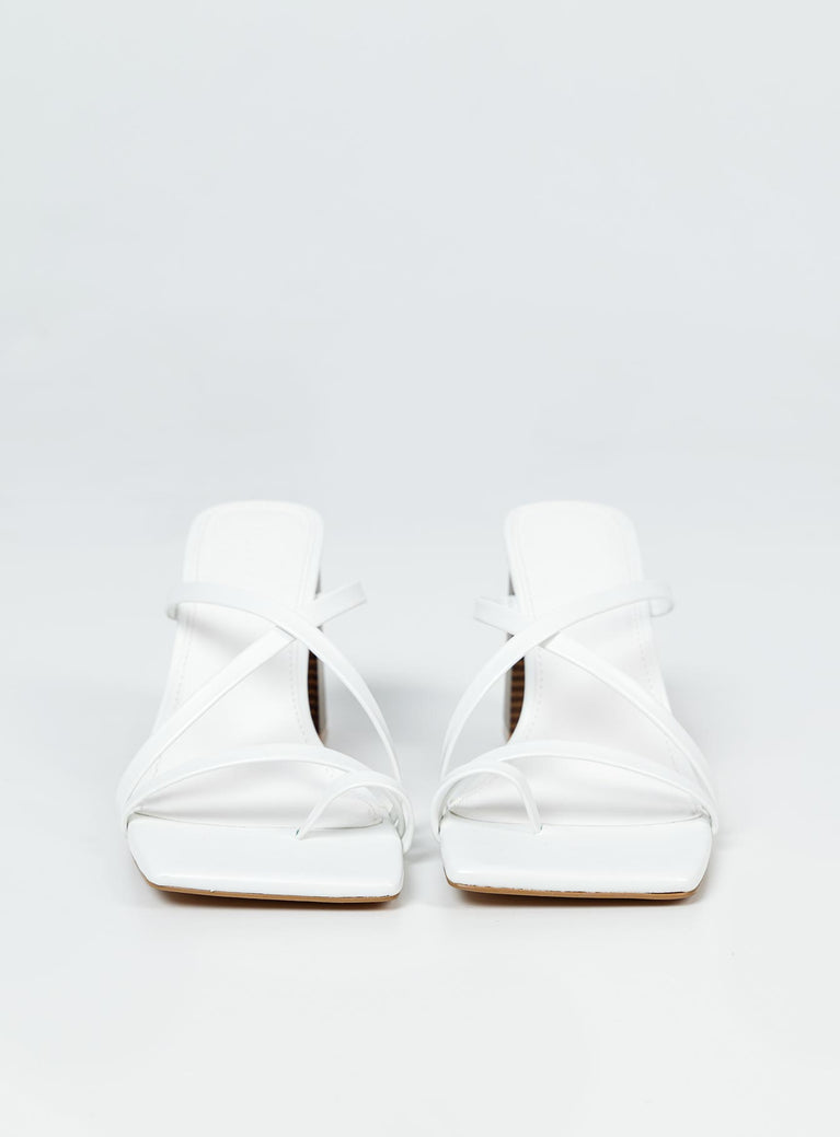Heels Princess Polly Exclusive Upper & Lining: 100% PU Outsole: 100% rubber Faux leather material Strappy upper Square toe Block heel Padded footbed