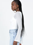 Long sleeve bodysuit Sheer mesh material Square necklace Tie fastening at bust Cheeky cut bottom Press clip fastening at base