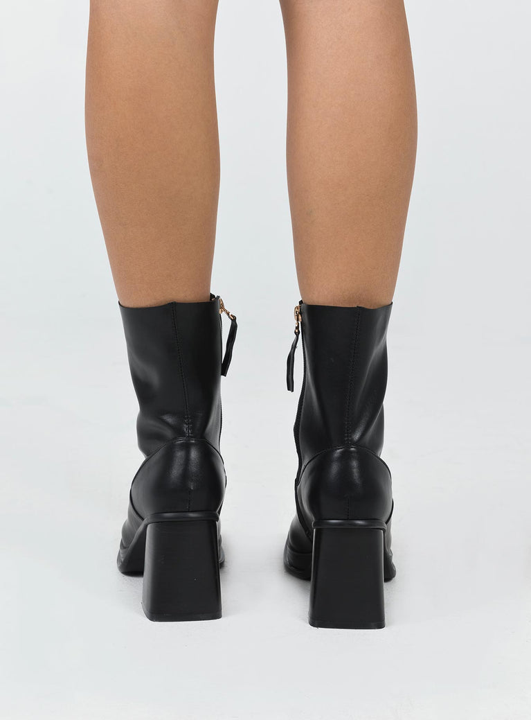Boots Faux leather material Zip fastening at side Square toe Platform base Block heel