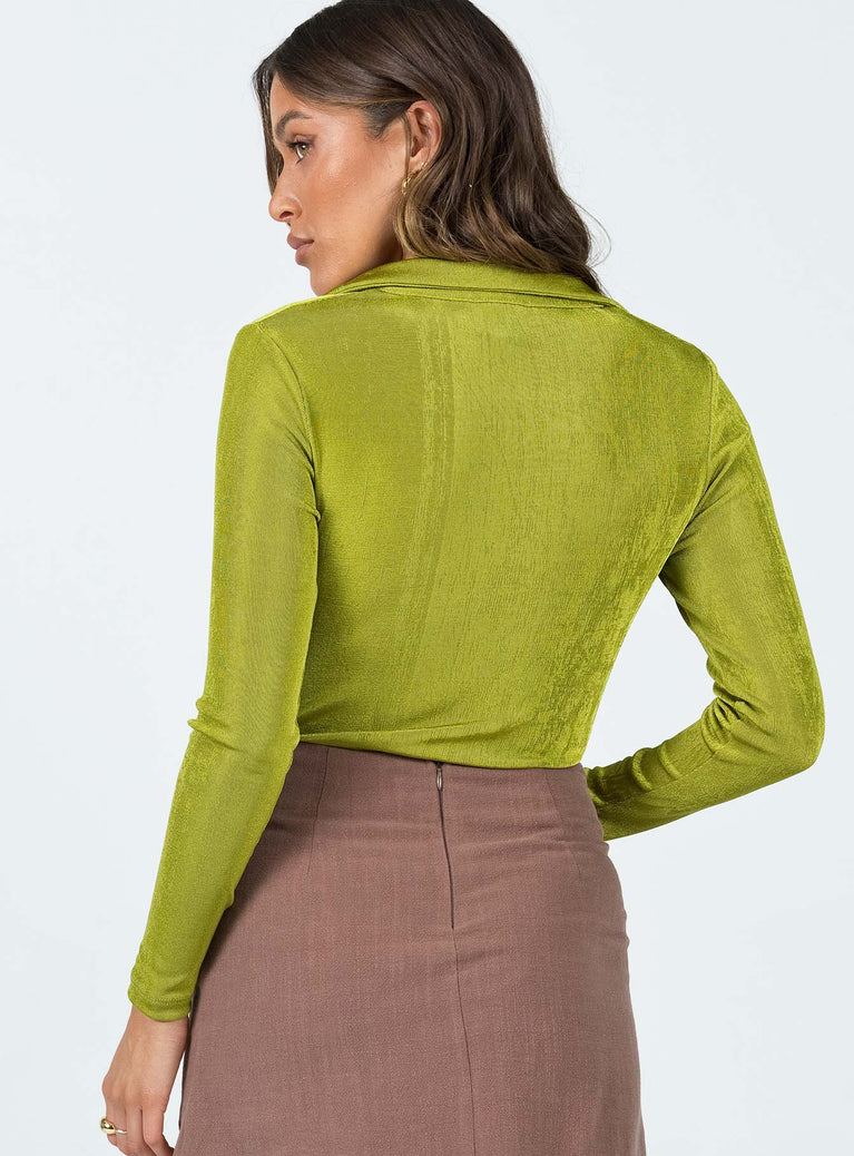Long sleeve bodysuit Soft knit material Wide v neckline Button front fastening Gathered neckline High cut leg Cheeky cut bottom Press clip fastening at base