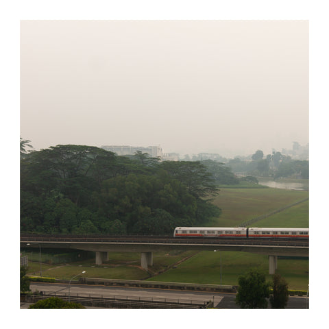 Train passing through on a hazy day