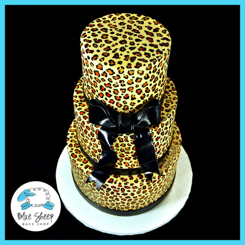 three tiered fondant animal print cake 