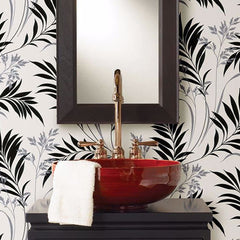 Add wallpaper to your powder room to complete the look.