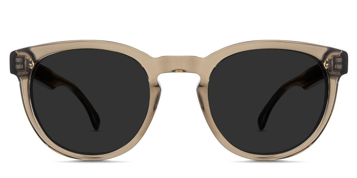 Arso black tinted sunglasses in the cougar variant - it's a full-rimmed transparent frame with a keyhole nose bridge and a visible hot metal inside the arm.