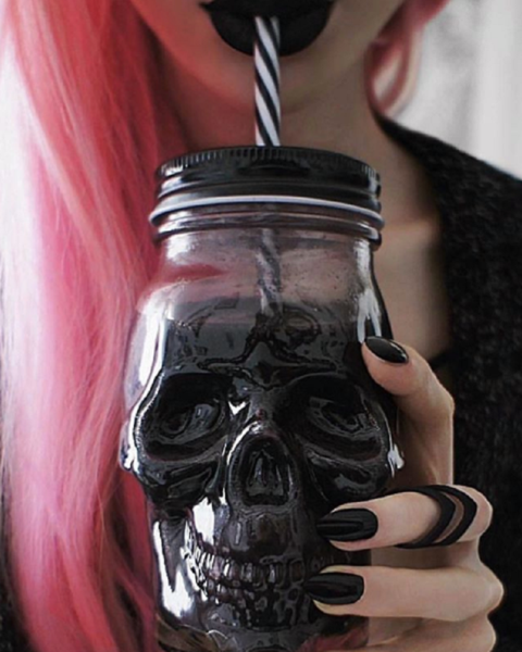 large glass skull jar