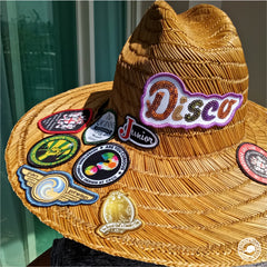 Straw Cap decorated with Patches that have Sticker Backing.