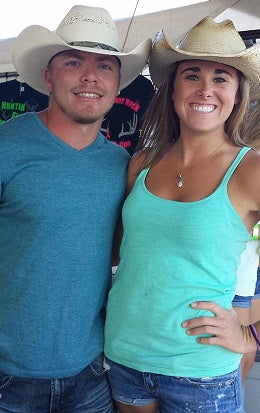 Customers in Gone Country hats at a country music festival