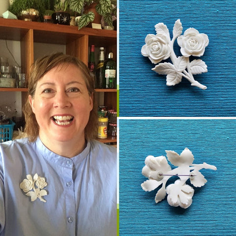 Audra wearing a 1950s white plastic brooch